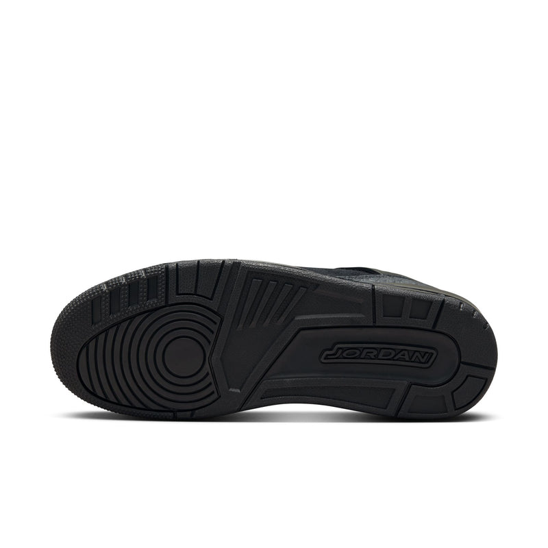 Black low-top sneaker outsole with Jordan logo and deep tread pattern