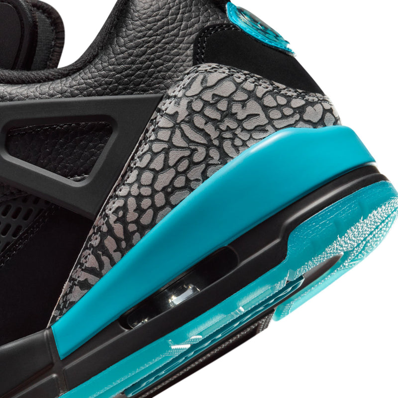 Men's low-top sneaker side detail, speckled panel with turquoise midsole and air window.