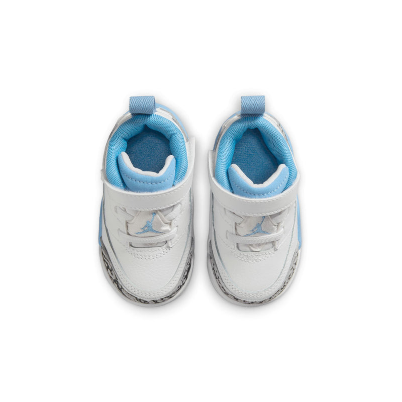Toddler low-top sneakers, white with light blue lining; rear view with cushioned collar