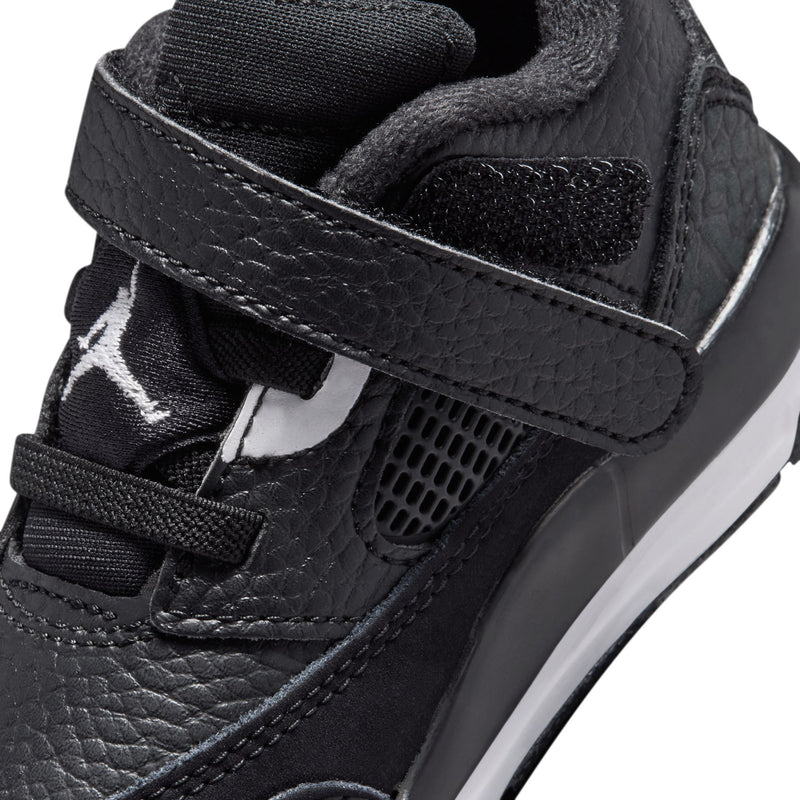 Black toddler sneaker upper close-up with textured leather, mesh, and white Jumpman