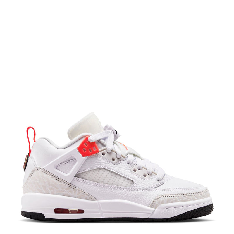 Youth low-top sneakers in white with bright crimson accents and dark rubber sole