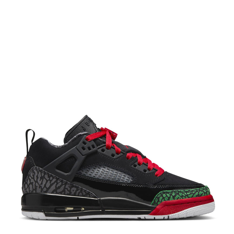 Youth low-top sneakers in black with red laces and green accent panels