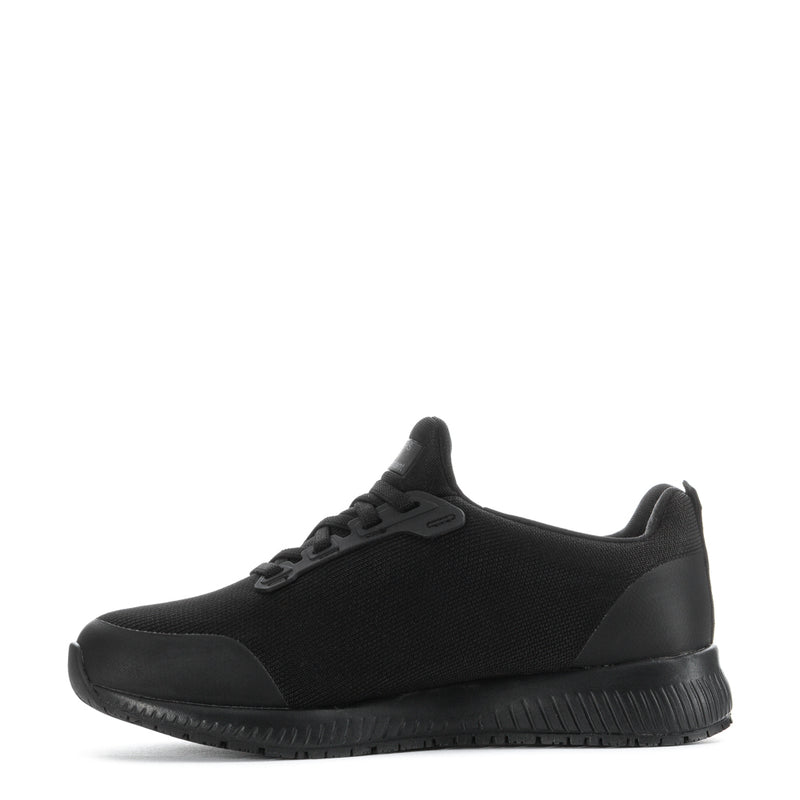 Women’s black athletic sneaker three-quarter side view with rubber toe and sole