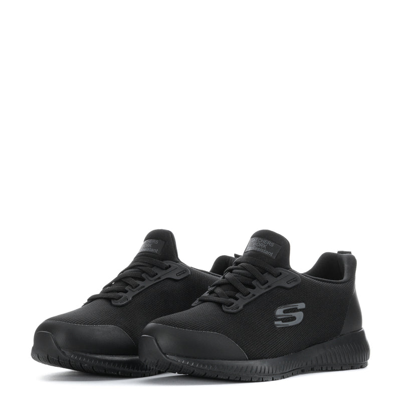 Pair of women’s black athletic sneakers with lace-up uppers and molded tread soles