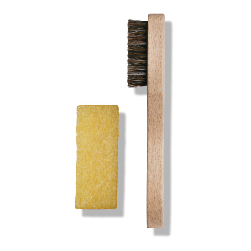 Suede brush with wooden handle and yellow cleaning eraser block