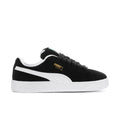 Mens black suede sneakers with white Puma stripe and white rubber sole