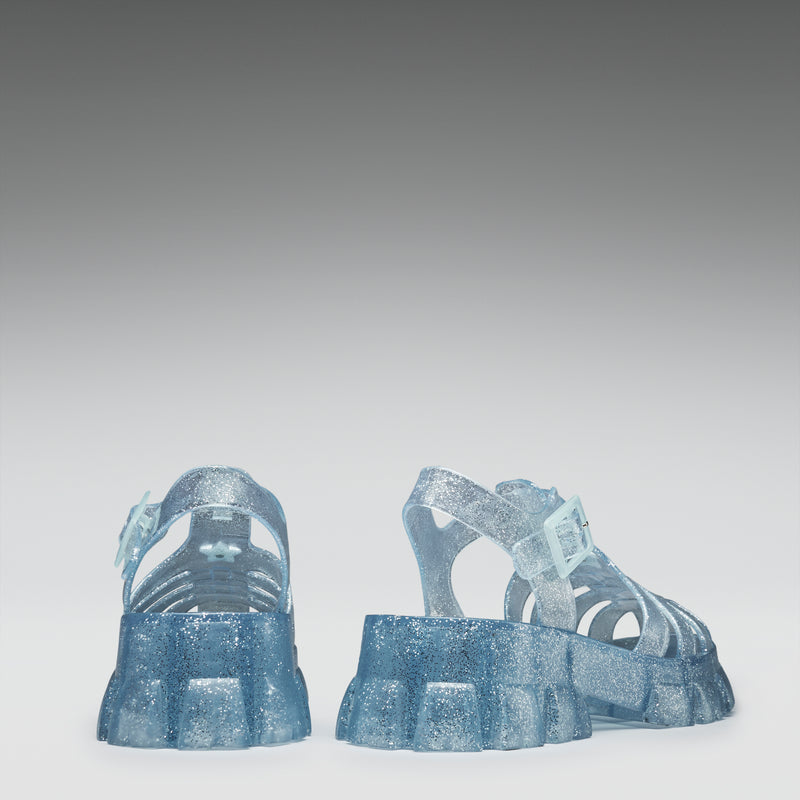 Pair of blue sandals on a gray background