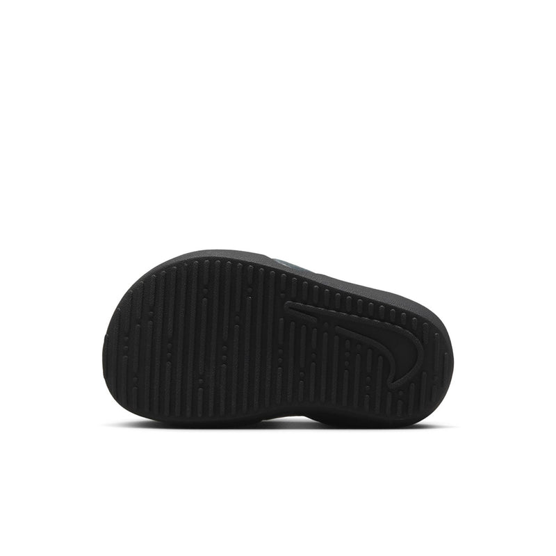 Toddler Nike black sandal outsole with textured tread pattern