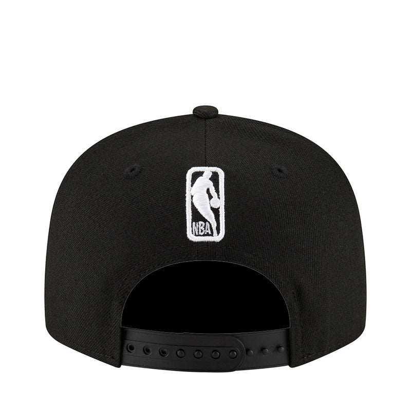 Black baseball cap with white vertical icon logo