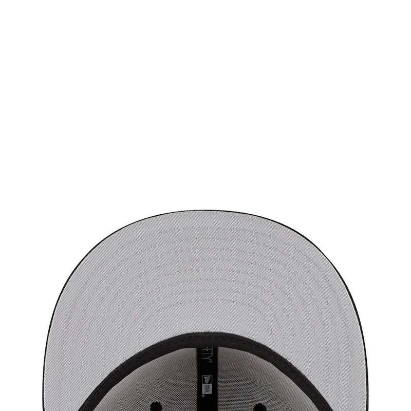 Gray cap interior with black adjustable strap and underside brim