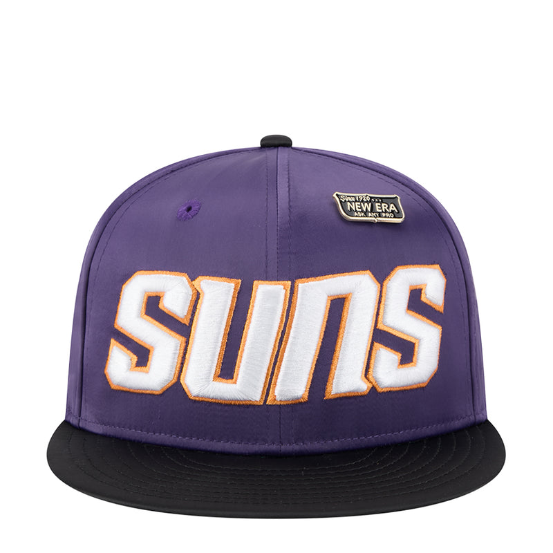 Two-tone basketball cap in purple with black brim, front SUNS lettering patch