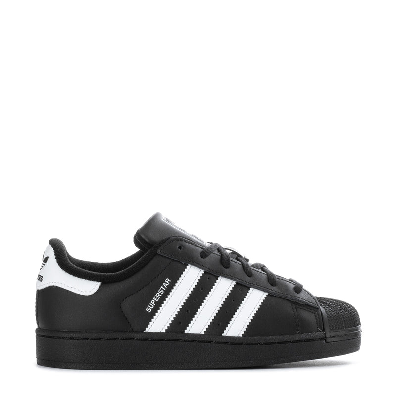 Kids black/white Adidas Superstar II sneakers, side view with stripes and laces