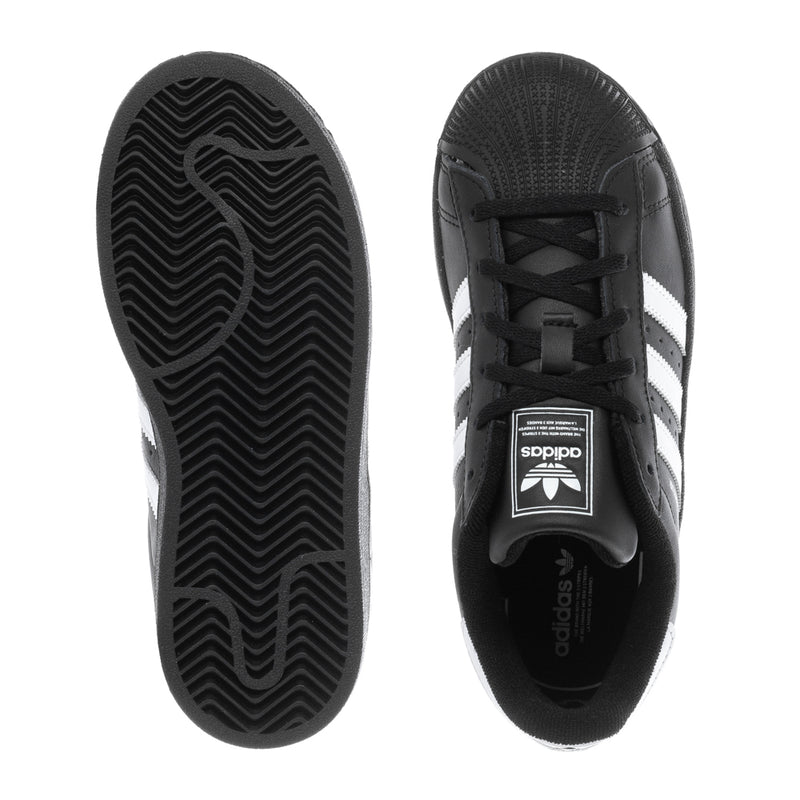 Kids black Adidas Superstar II outsole and upper, tread pattern and lace front