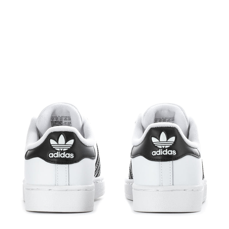 Kids' adidas low-top sneakers, heel view with black adidas logo and white cupsole