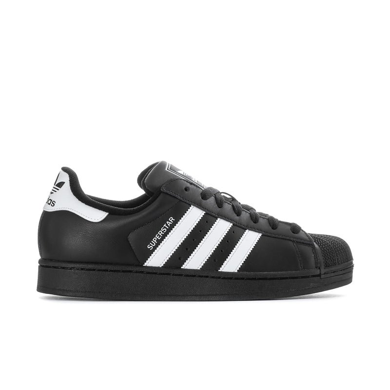 Black leather lace-up sneakers with white triple stripes and low-profile rubber sole
