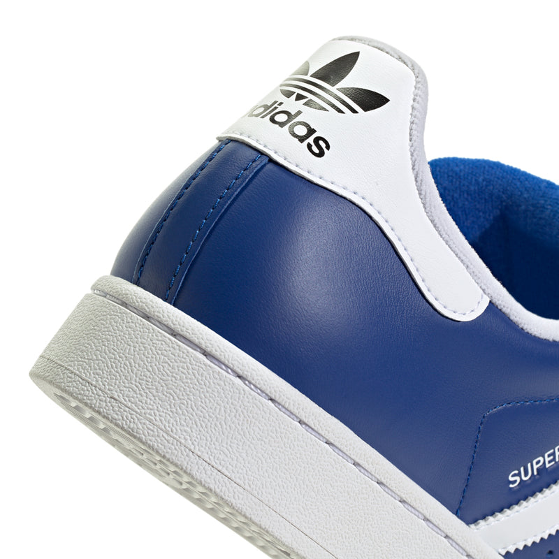 Men's Superstar II sneakers close-up, blue leather quarter with white collar and adidas logo