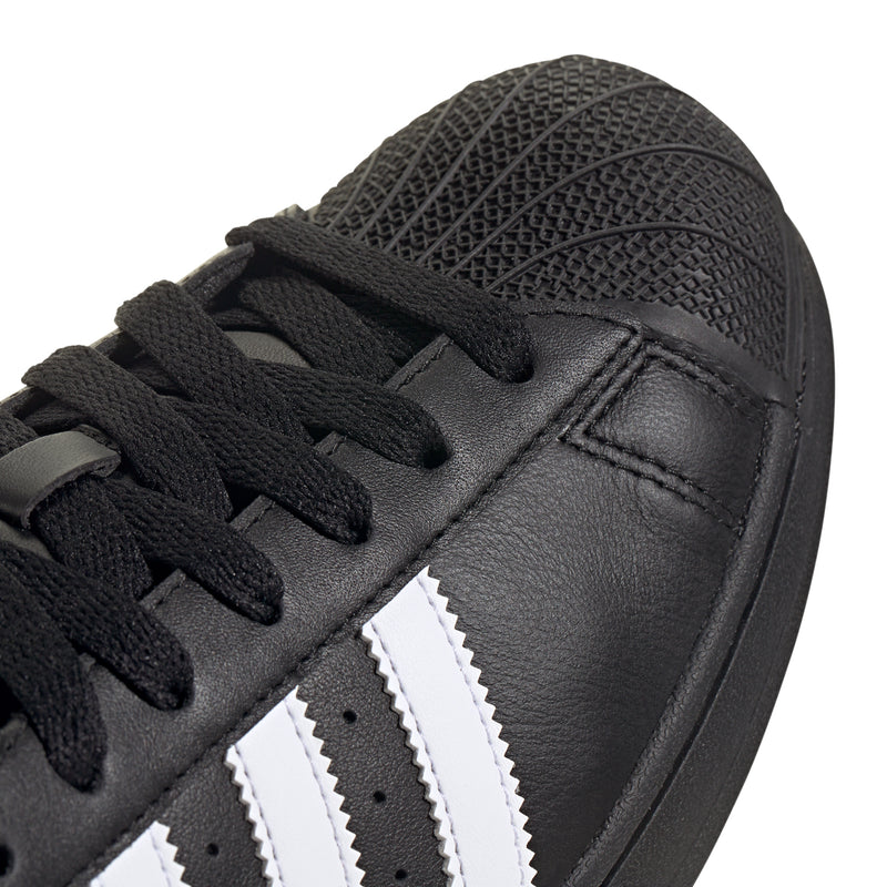 Black leather upper with black laces and white three-stripe detail