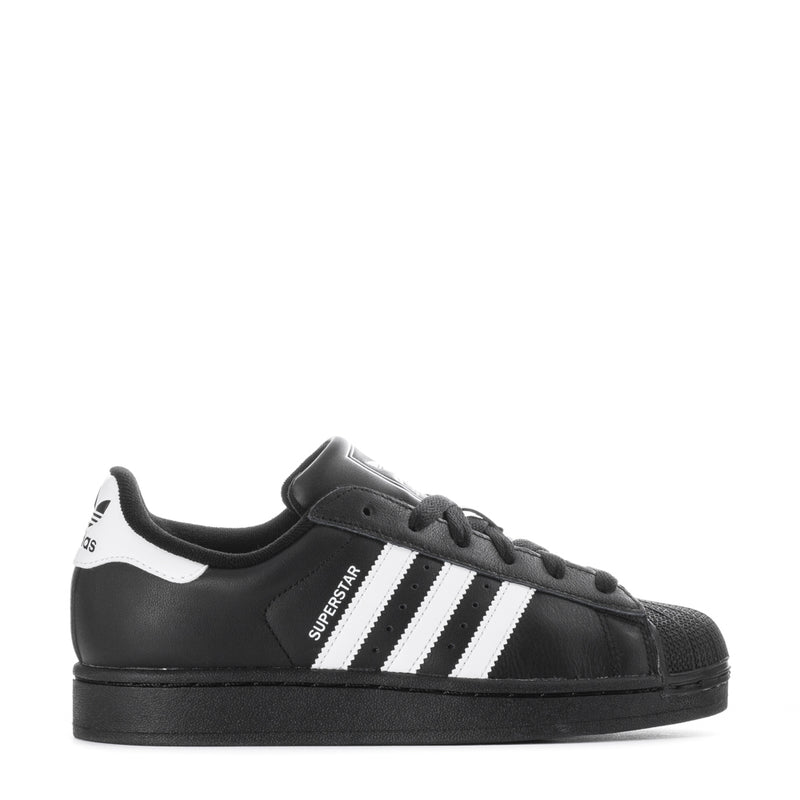 Black low-top lace-up sneakers with white three-stripe side and Superstar II label.
