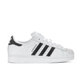 Women's low-top sneakers in white with black three-stripe details, lace-up design