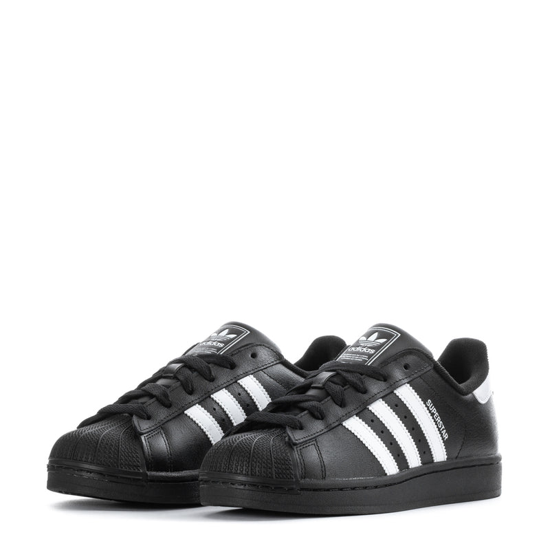 Youth Superstar II sneakers pair, black with white triple stripes and laces