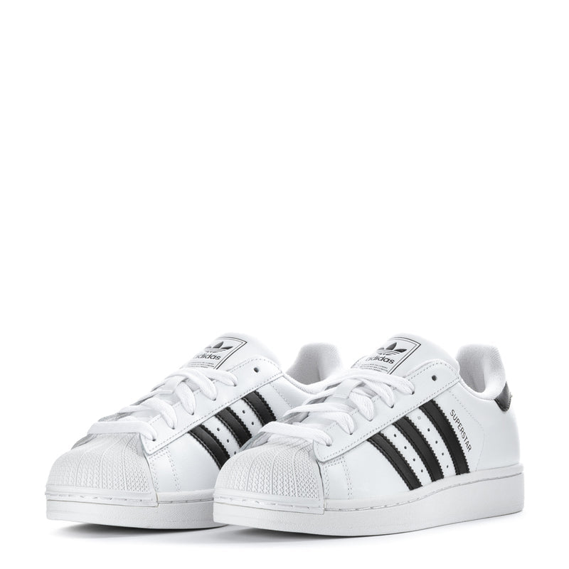 adidas Superstar II youth sneakers, pair in white with black stripes and white laces