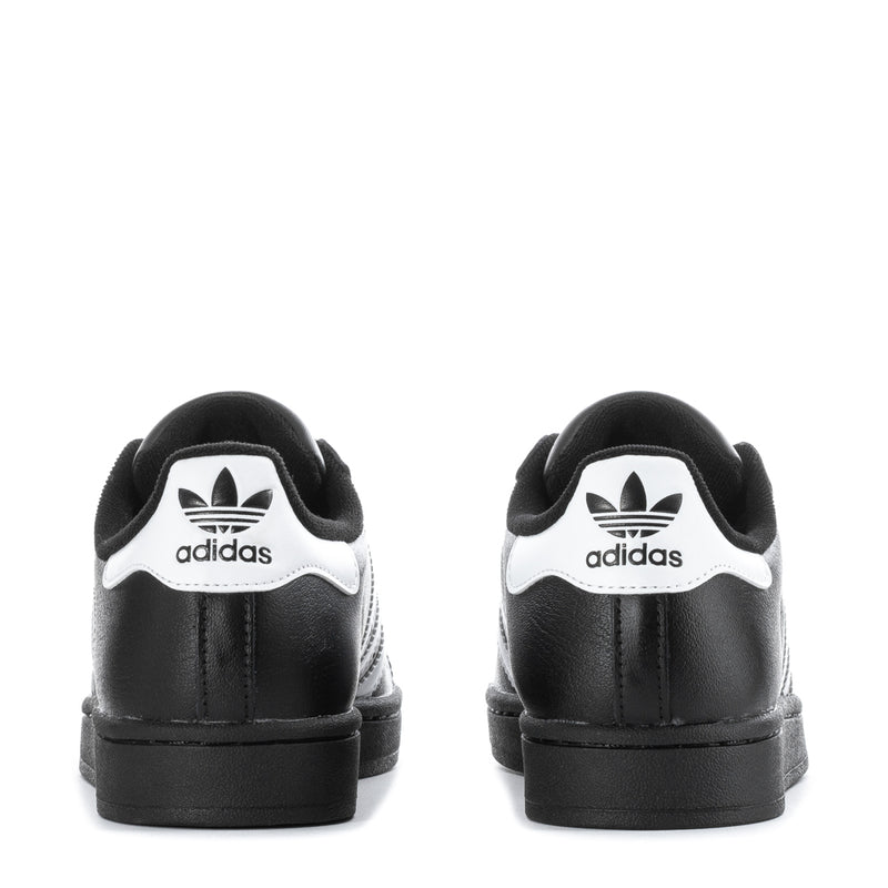 Youth Superstar II sneakers, black heel with white adidas and three-stripe branding