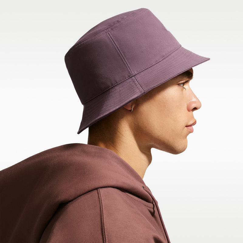 Mauve bucket hat with angled side panel stitching, wide brim