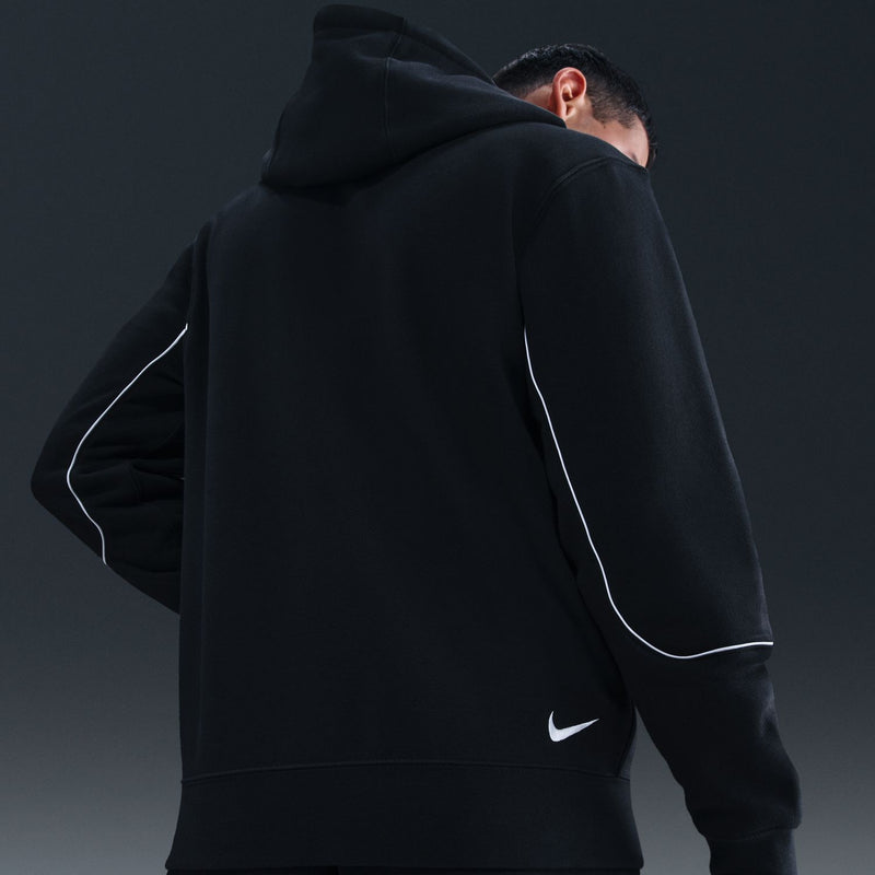 Men's black hoodie back view with white piping and Nike swoosh on lower sleeve