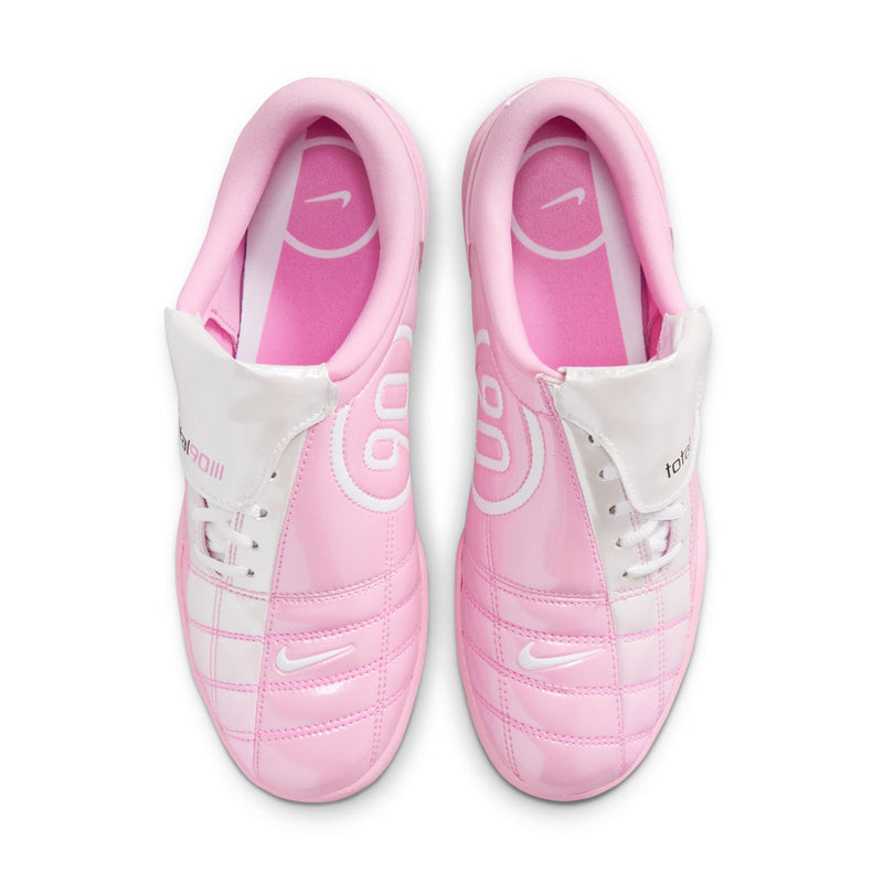 Pink and white women's sneakers with lace-up front and side swoosh