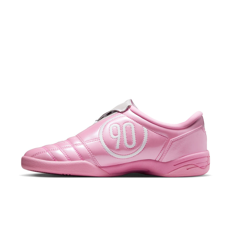 Pink and white women's low-top sneakers, side view with textured stripes