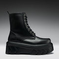 Black leather boot with thick sole on a gradient background