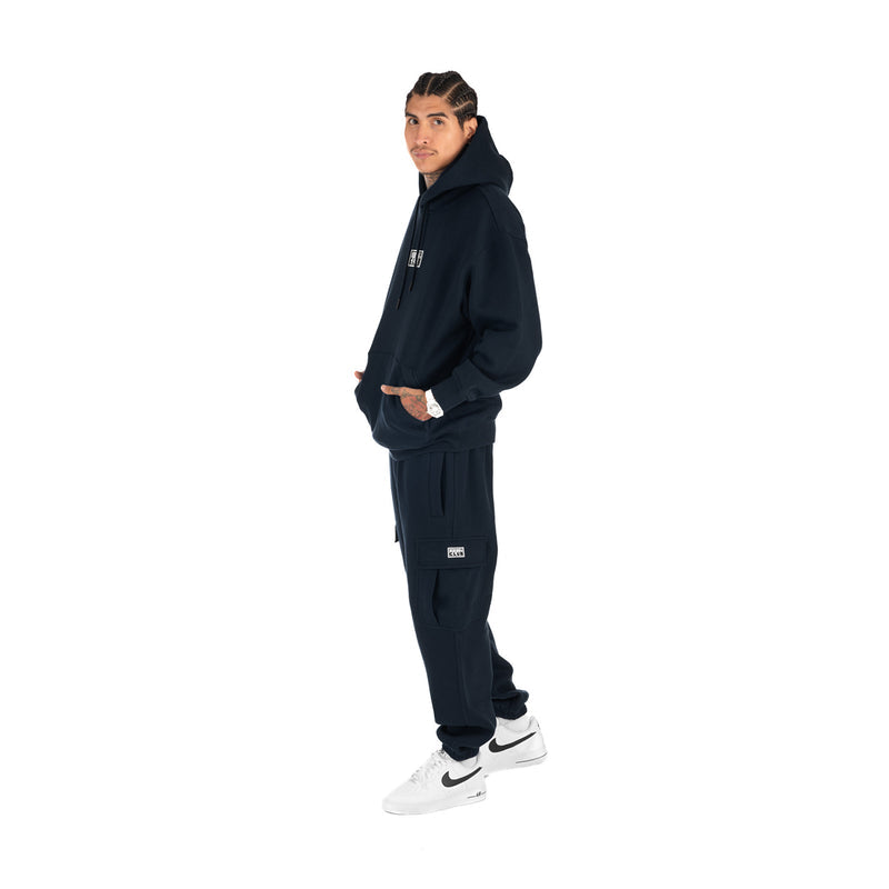 Men’s navy tapered cargo fleece pants with cargo pocket and elastic cuffs