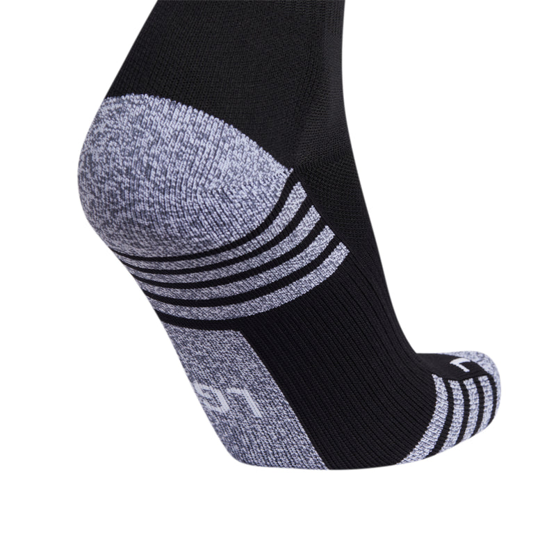 Black soccer crew socks with white ripple stripes and gray cushioning