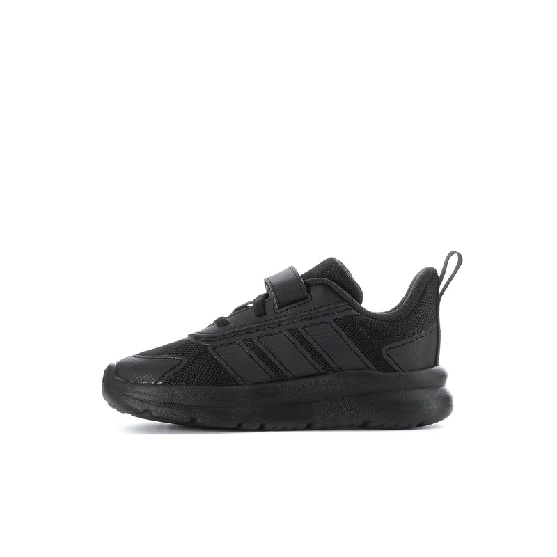 Toddler black running shoes, angled side view, with lace-up upper and molded stripes