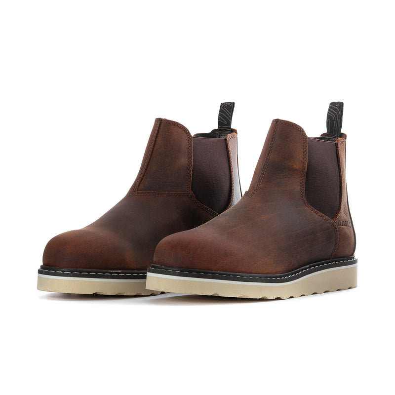 Pair of women’s wide Chelsea boots in dark brown suede with elastic side panels