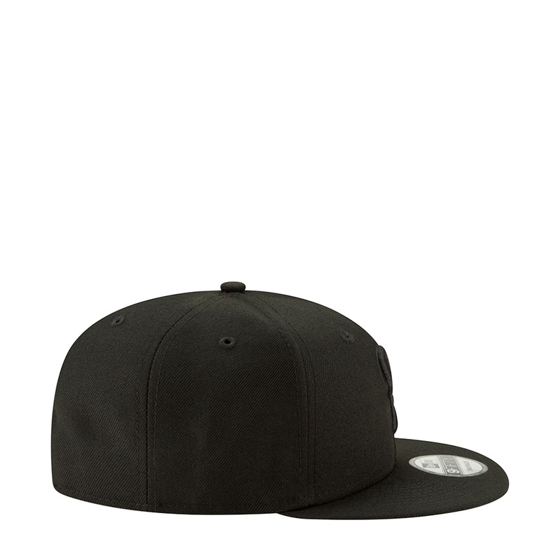 Black baseball cap with curved brim and side profile, no visible front graphics