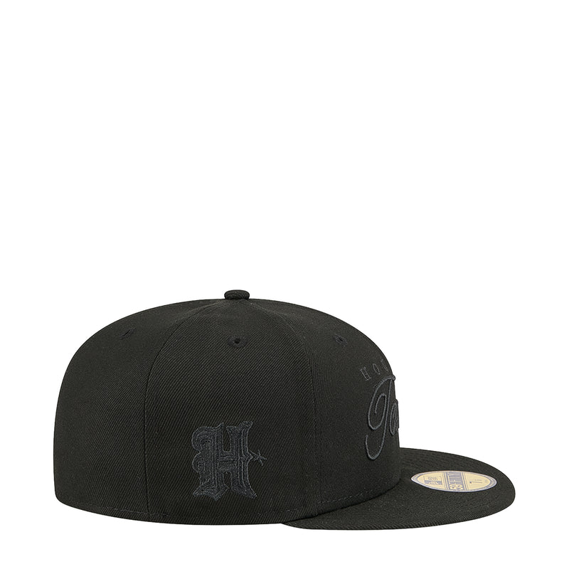 Black baseball cap with embroidered team logo on the side