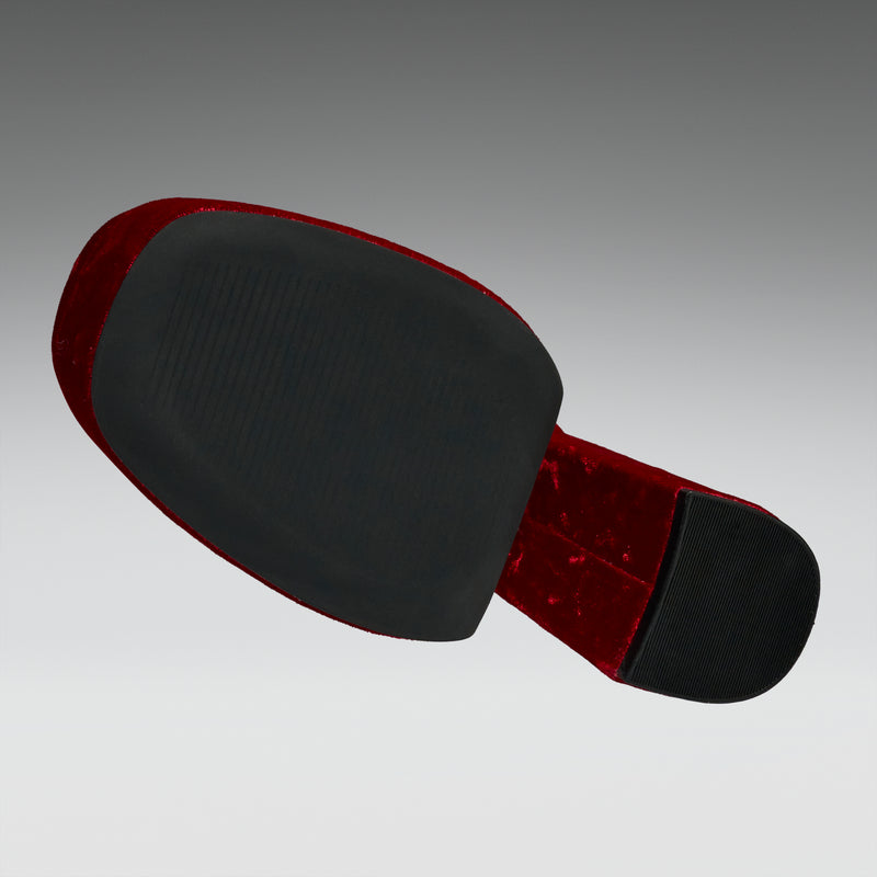Black and red motorcycle seat on a gray background