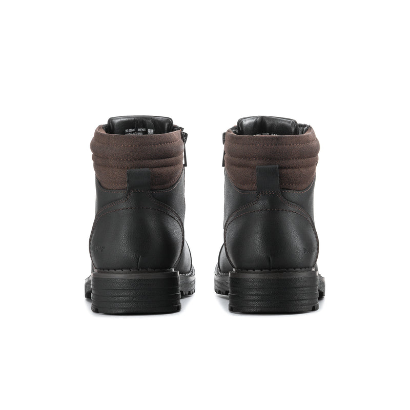 Men's black ankle boots with rear heel tab and thick treaded rubber sole