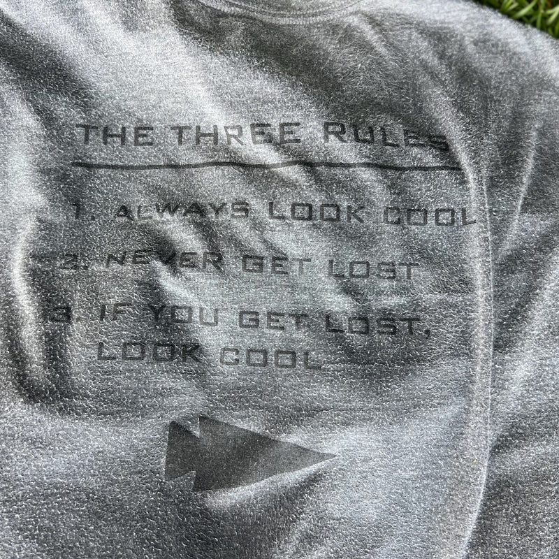 The Three Rules Tee - Unisex Tri-BlendX: a gray GORUCK shirt featuring the printed text, "The Three Rules: 1. Always look cool, 2. Never get lost, 3. If you get lost, look cool.