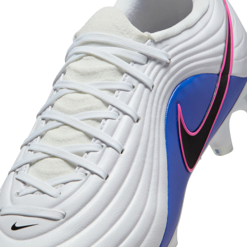 Close-up men's white lace-up soccer cleats with blue panel and pink/black swoosh