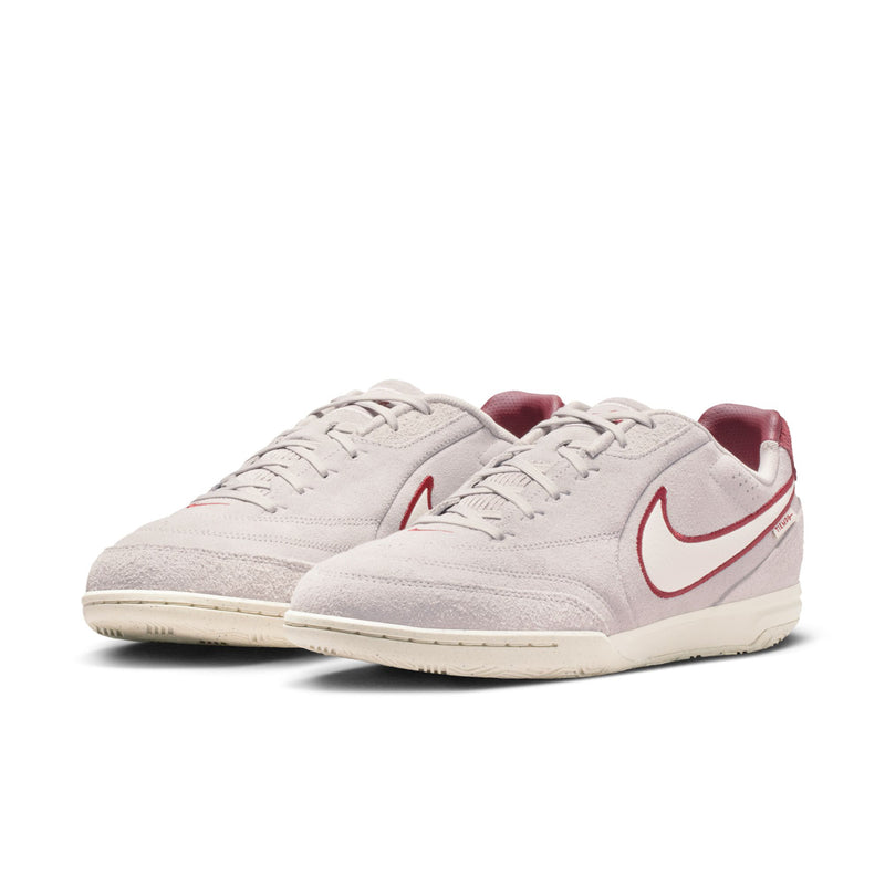 Men's low-top sneakers, light gray with red swooshes and white midsoles, side view