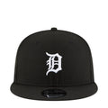 Black baseball cap with white Tiger logo and curved brim