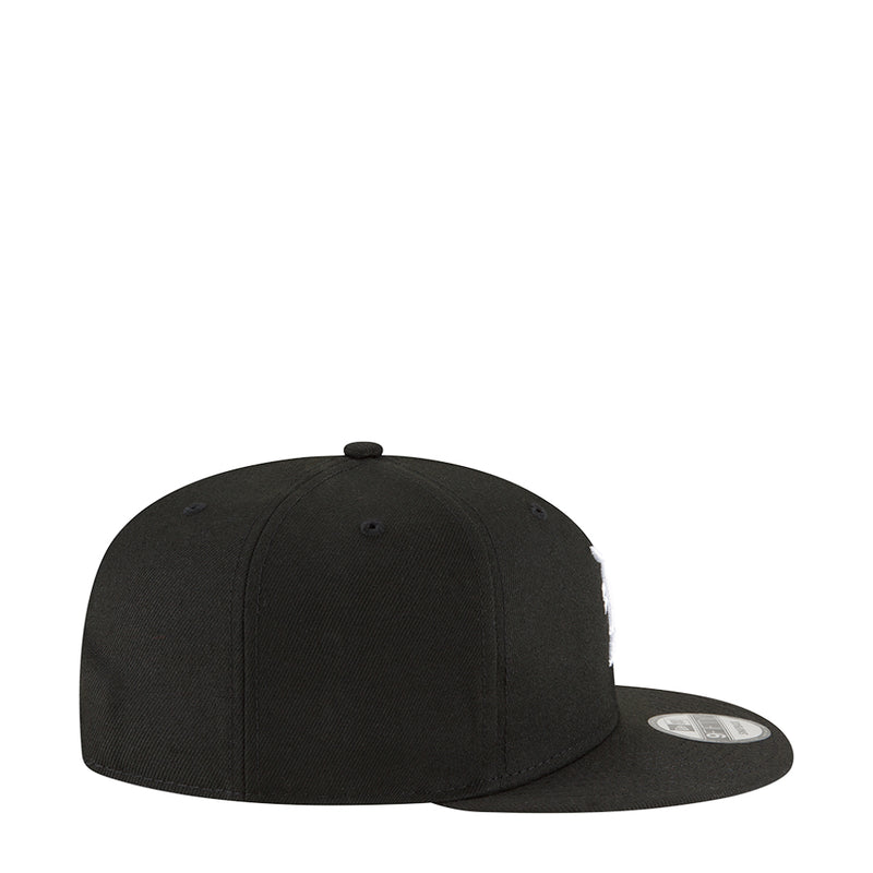 Black baseball cap side profile with curved brim