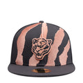 Dark grey snapback cap with coral tiger face patch and striped panels