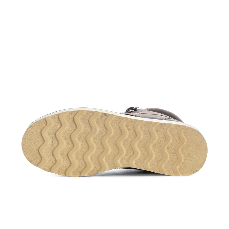 Men's steel-toe boot outsole with light beige tread and dark heel edge