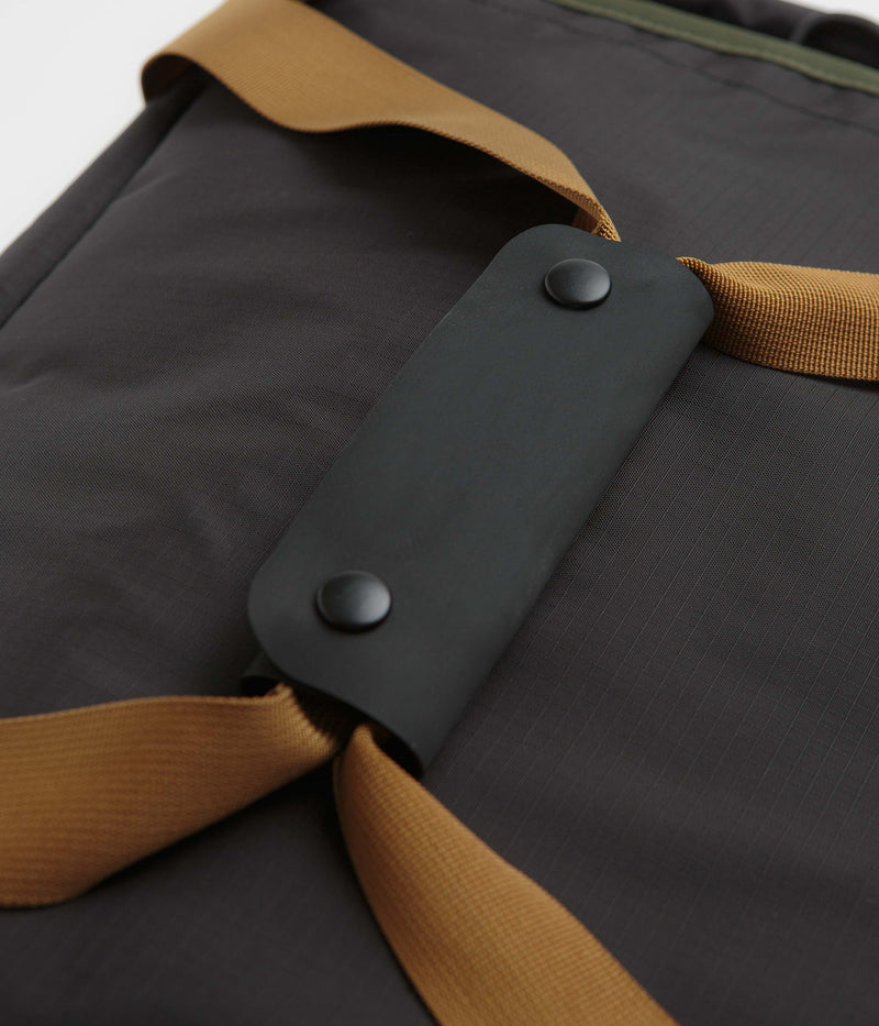 Topo Designs Mountain 40L Duffel Bag in Black and Neutral