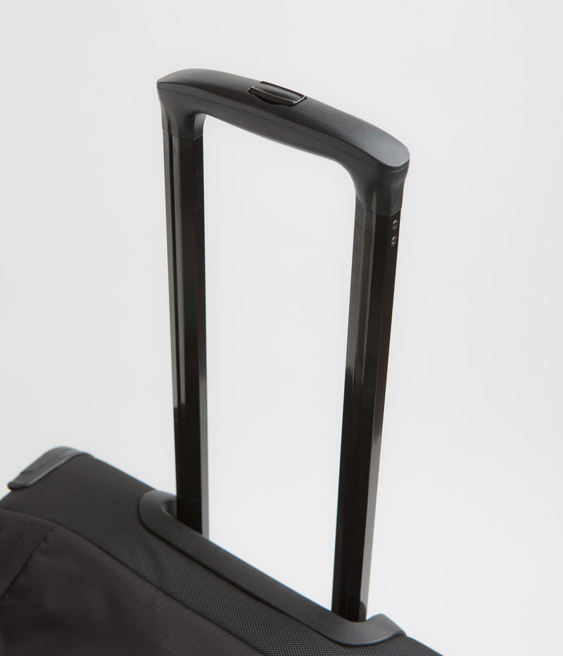 Topo Designs Mountain 90L Roller Duffel Bag in Black and Neutral