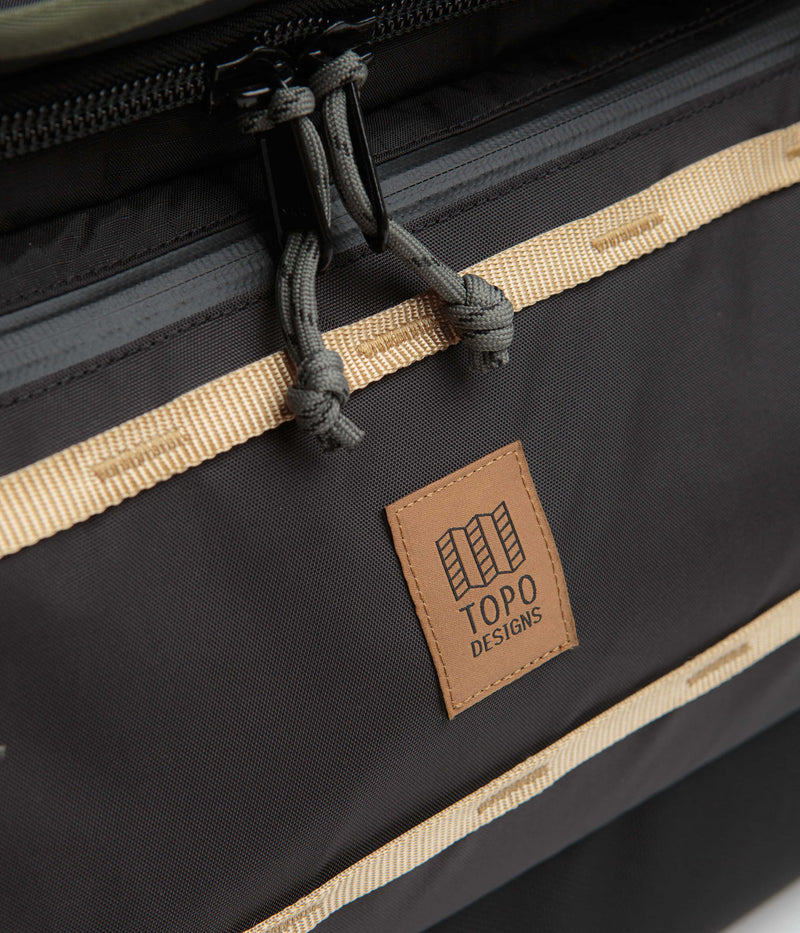 Topo Designs Mountain 90L Roller Duffel Bag in Black and Neutral