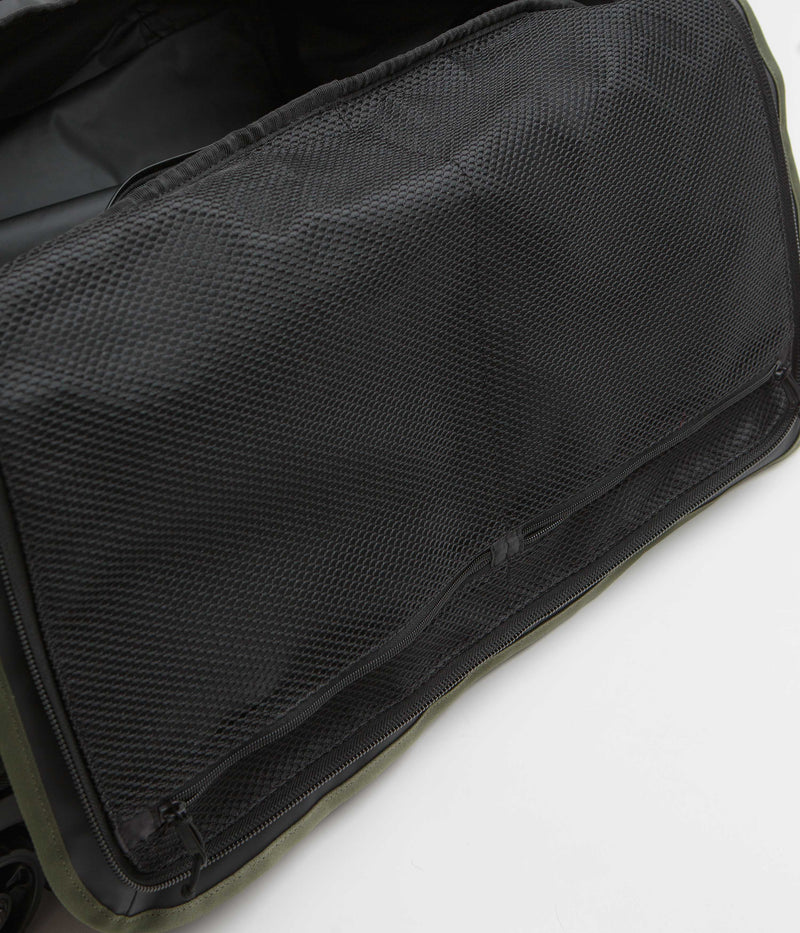 Topo Designs Mountain 90L Roller Duffel Bag in Black and Neutral